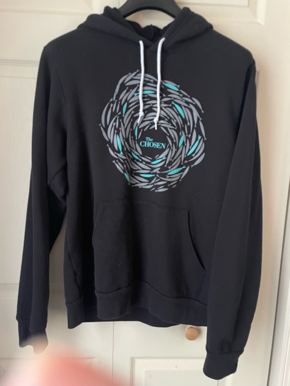 The Chosen “Against the Current” Black Hoodie with Teal & Gray Graphic, unisex